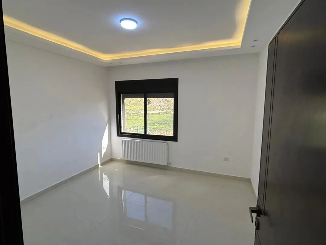 دوبلكس فاخر للبيع في حي المنصور إطلالة مفتوحة وتصميم عصري
