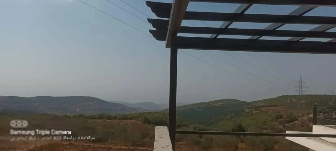 ارض وبيت بام الينابيع /عجلون باطلاله مميزه ومحاطه بالغابات والاكواخ السياحيه للبيع تصلح للاستثمار
