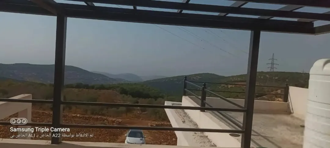 ارض وبيت بام الينابيع /عجلون باطلاله مميزه ومحاطه بالغابات والاكواخ السياحيه للبيع تصلح للاستثمار