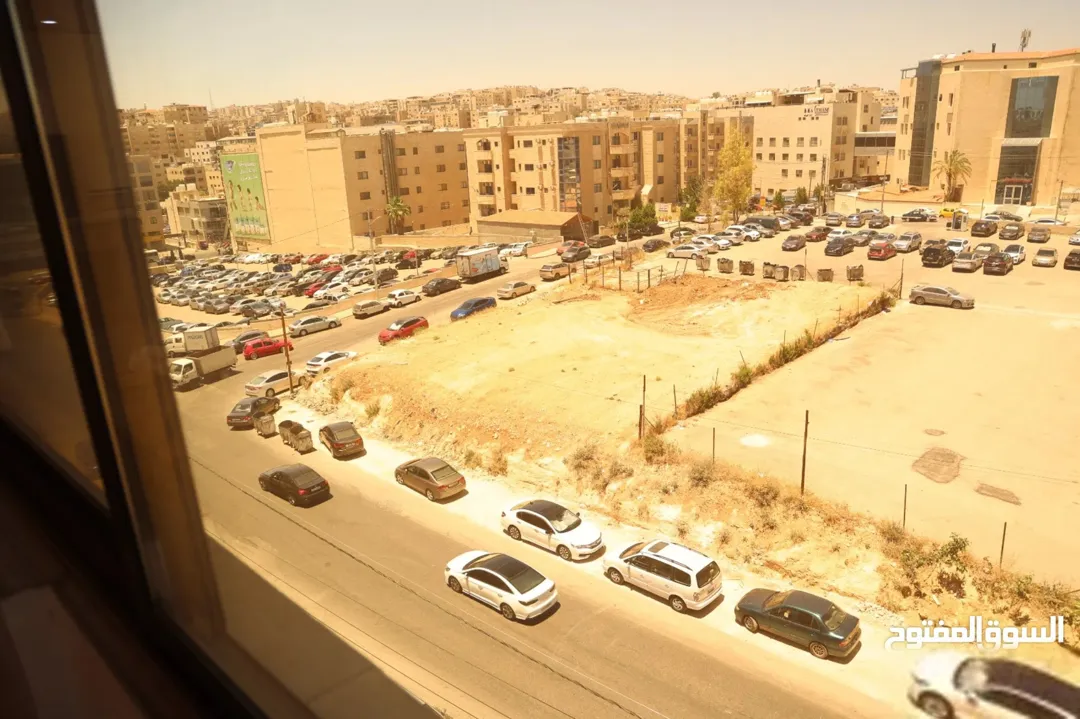 شقة مع روف للبيع في تلاع العلي بإطلالة مميزة ومساحة واسعة