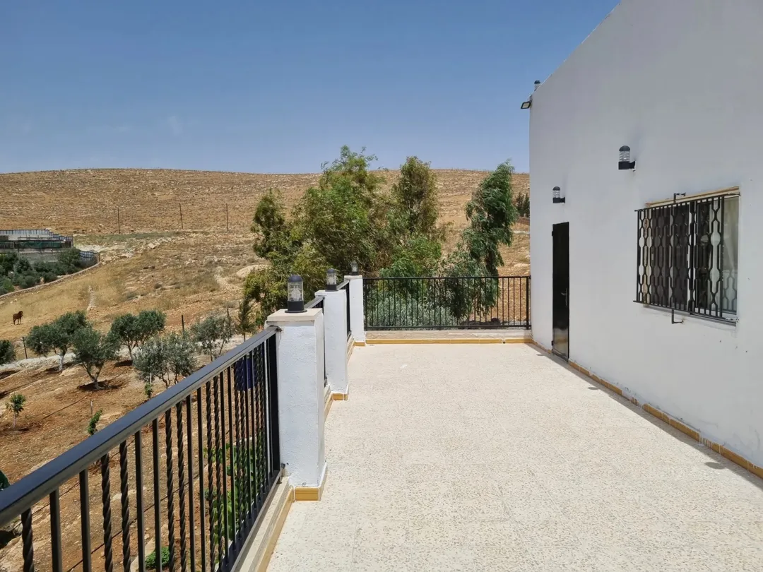 مزرعة للبيع في بلعما 5 6 دونم مع شاليه وبرنده