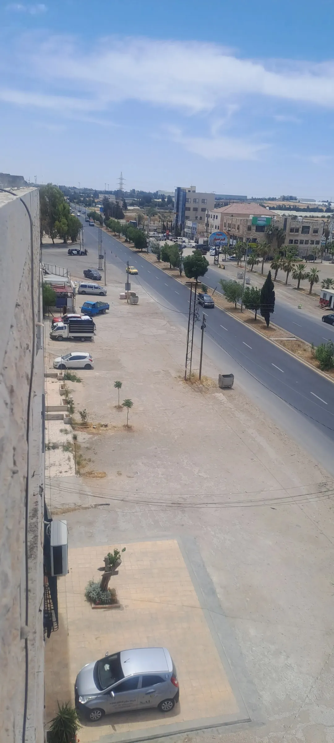 ارض مع مجمع تجاري