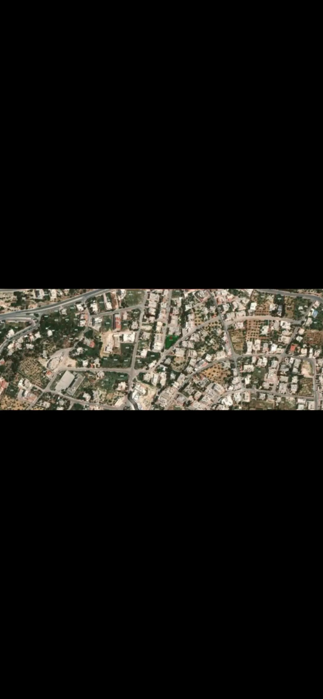 قطعة ارض بالفحيص للبيع على شارعين
