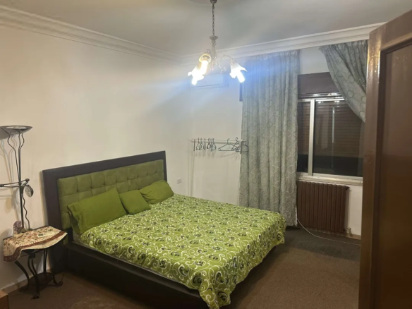 Luxury first-floor apartment with 3 master bedrooms, 3 bathrooms, a balcony, two family rooms and a large kitchen, fully furnished – Amman, Jordan | ID 593584