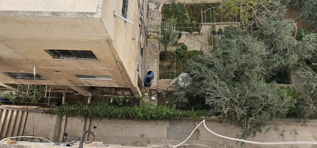عماره للبيع في الزرقاء حي الإسكان