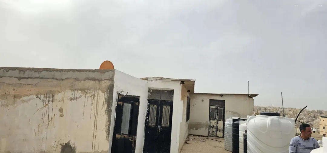 عماره للبيع في الزرقاء حي الإسكان