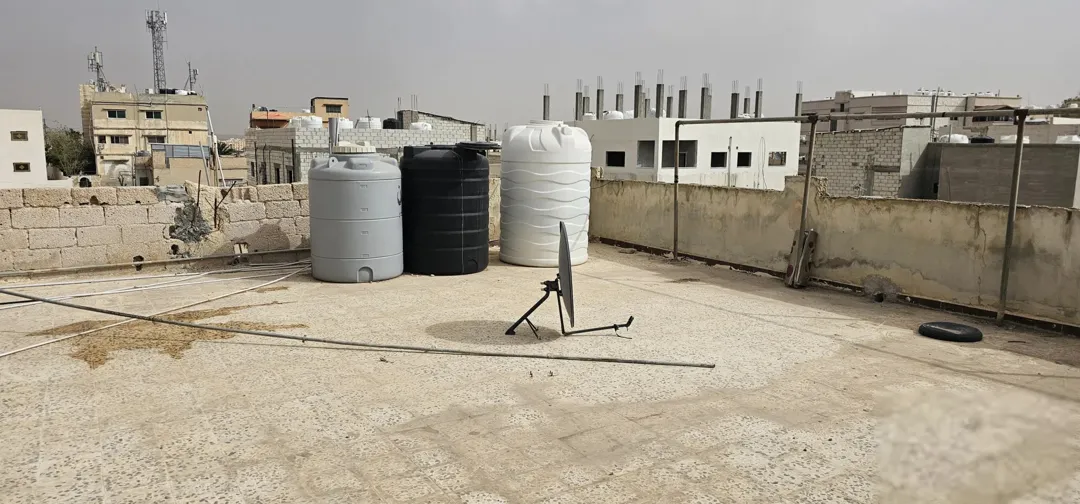 عماره للبيع في الزرقاء حي الإسكان