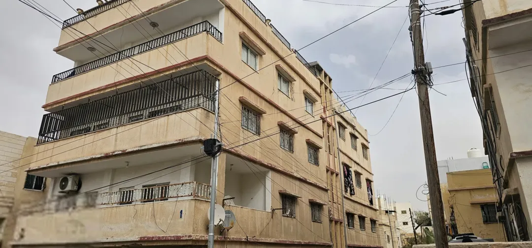 عماره للبيع في الزرقاء حي الإسكان
