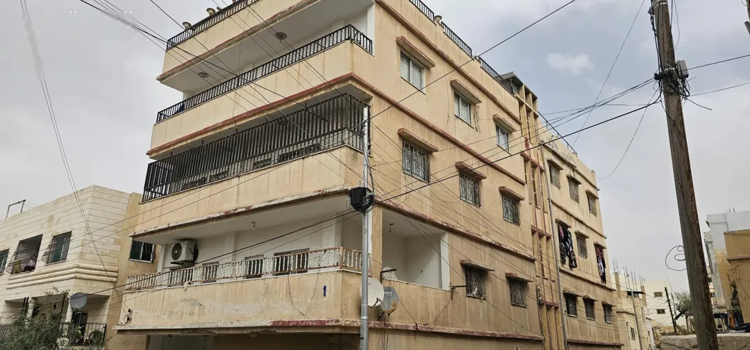 عماره للبيع في الزرقاء حي الإسكان