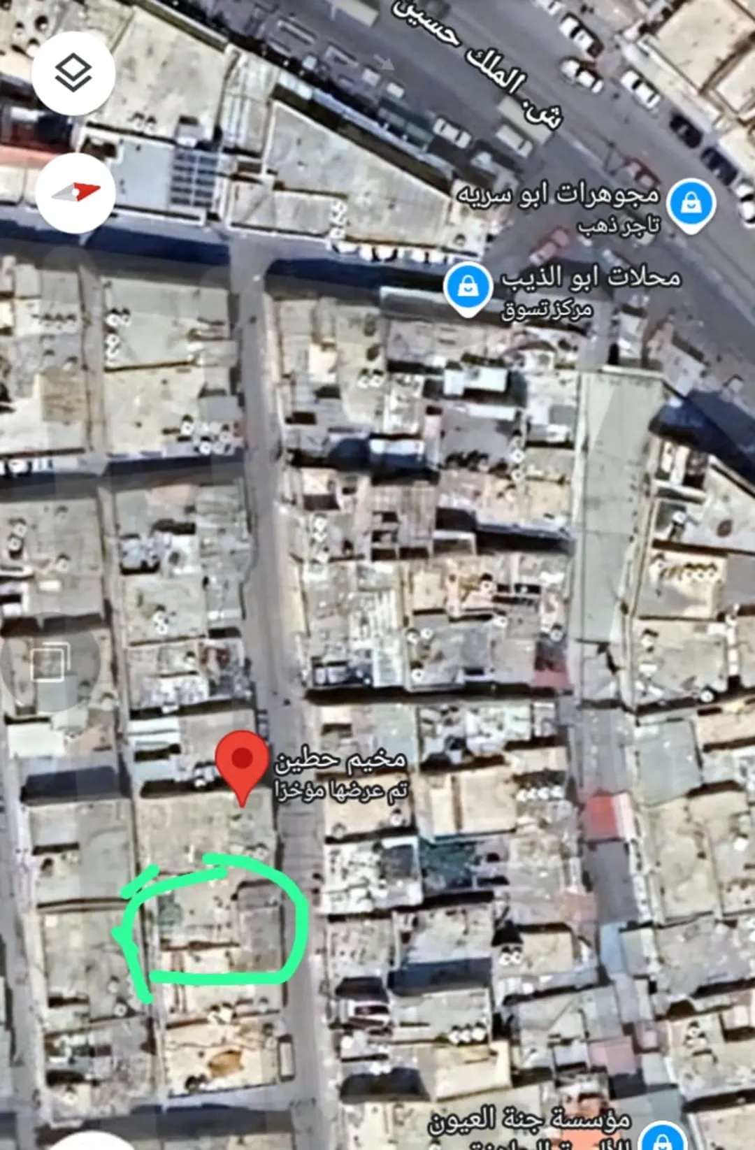 عمارة سكنية في مخيم حطين
