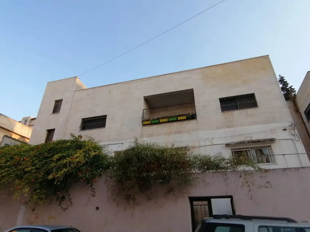 عقار سكني استثماري للبيع في صويلح بمساحة أرض 614 م2