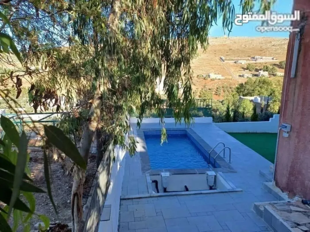 مزرعة لقطة مع بيت ريفي ومسبح في دحل شرق جرش منطقة مزارع وشاليهات قوشان