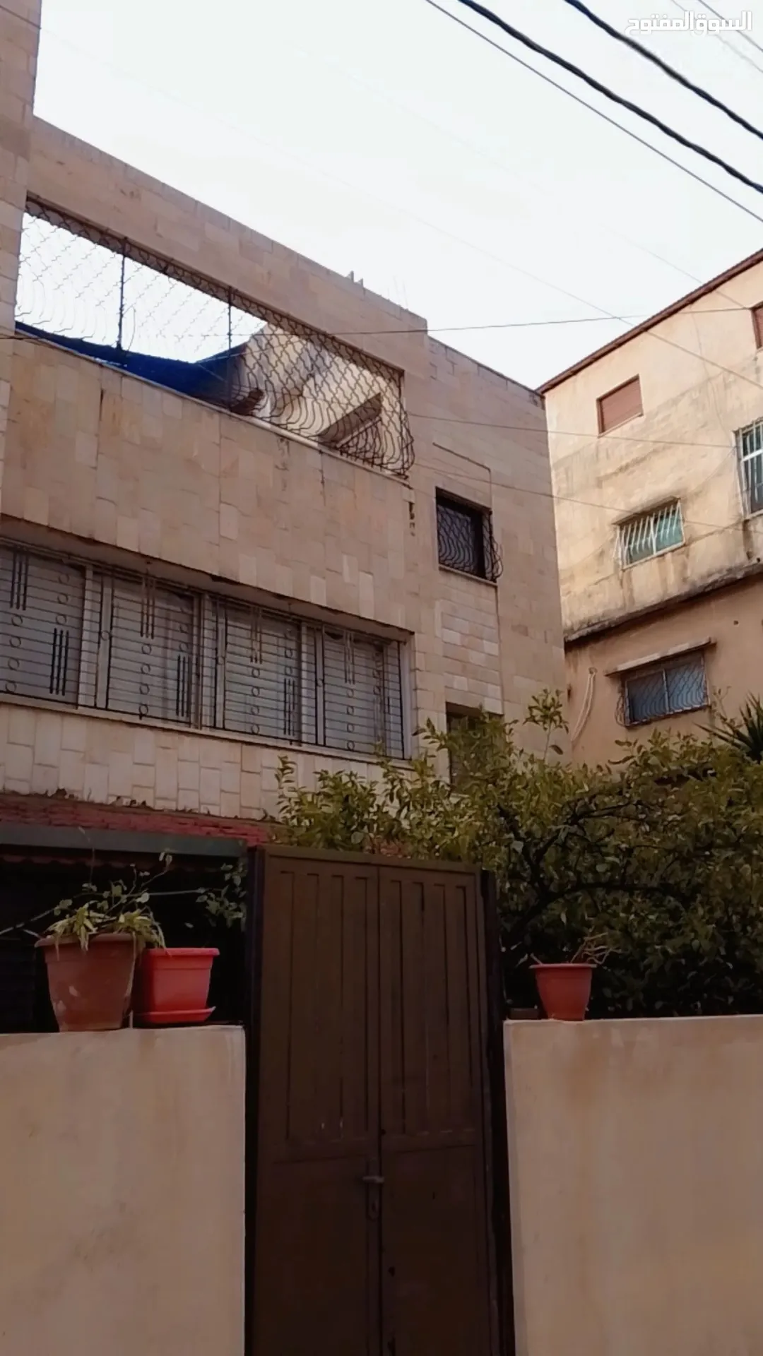 عمارة استثمارية للبيع في حي نزال – الذراع الغربي