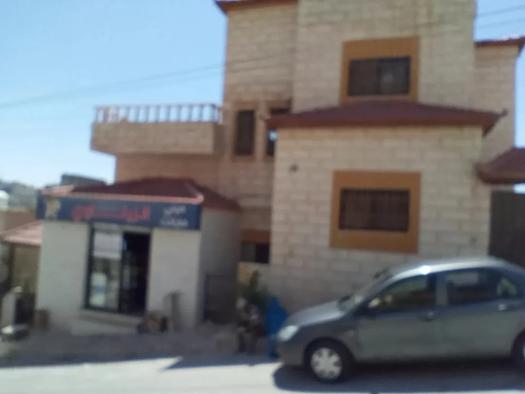 عمارة استثمارية في الرصيفة – حي الرشيد