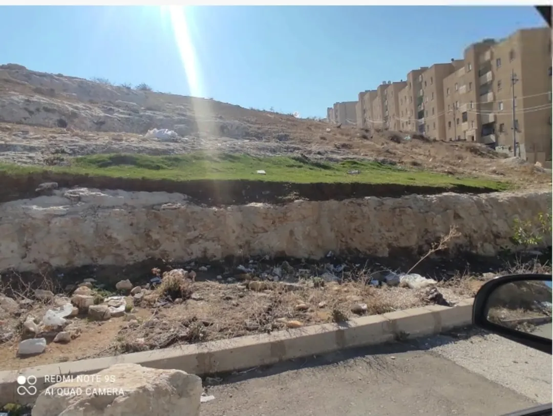 ارض ابو علندا طريق الحزام بسعر مغري