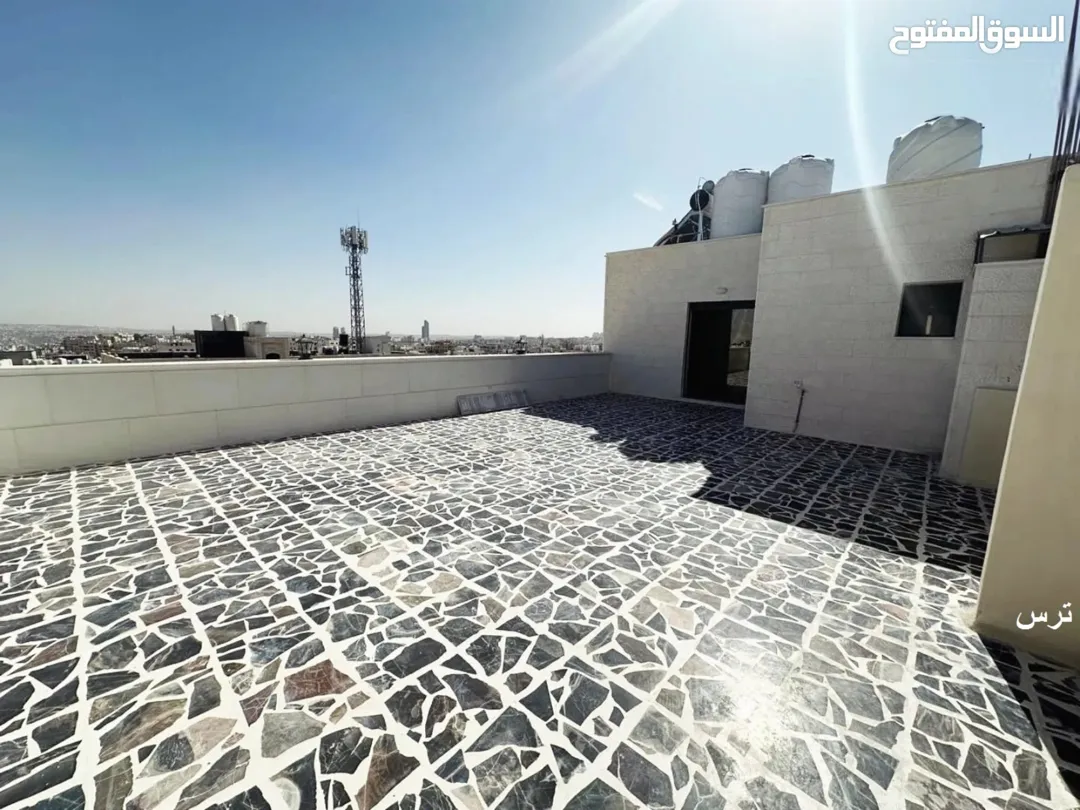 شقة دوبلكس فاخرة جديدة في المدينة الرياضية روف دوبلكس مميز