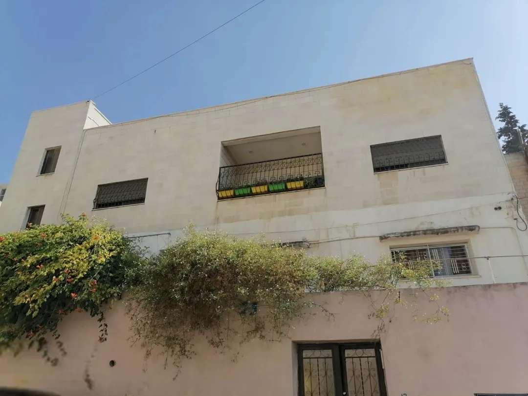 صويلح عقار سكني قائم للبيع قطعة أرض 614 م2