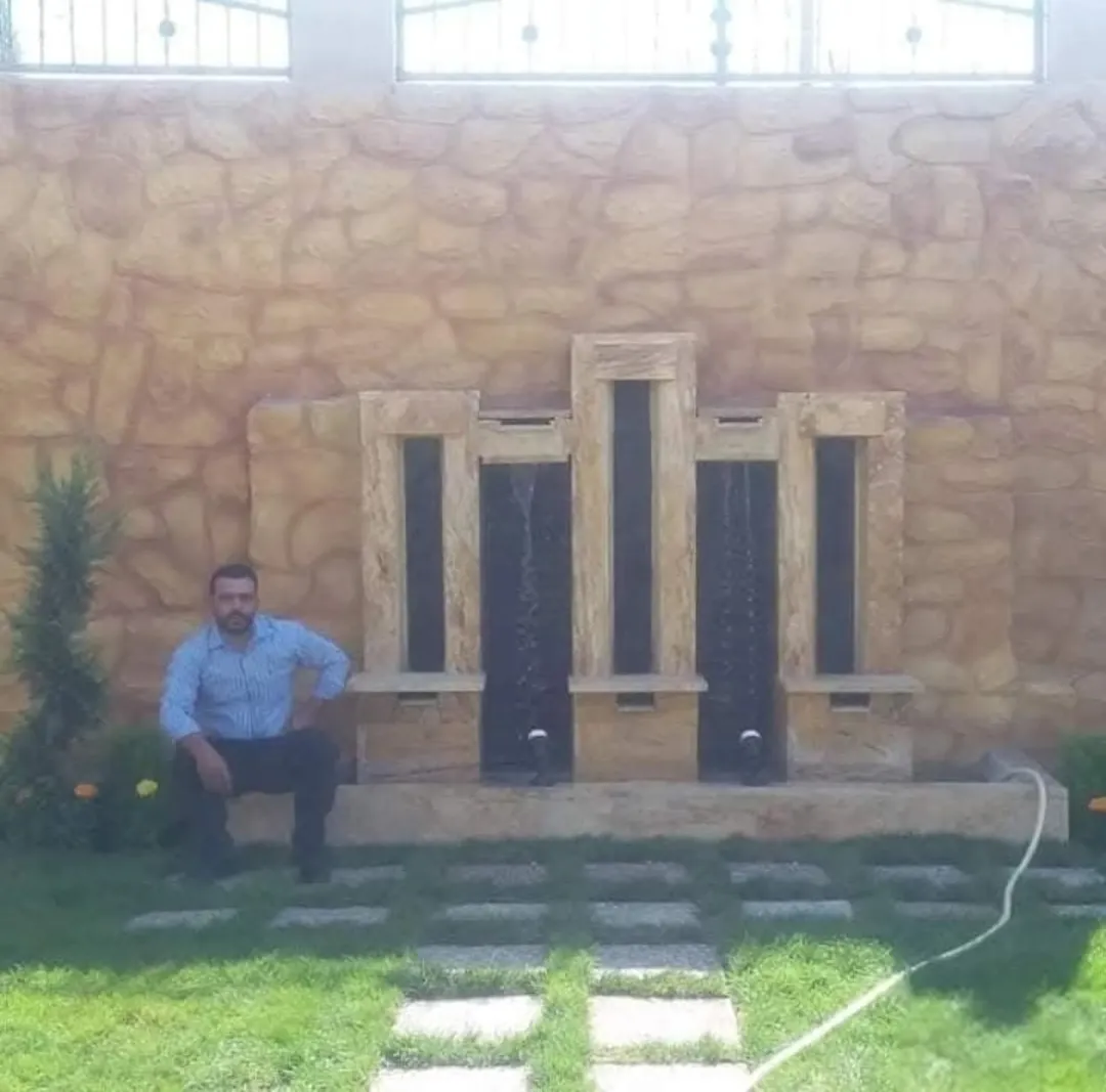 تنسيق حداق واعمال. البربكيو والشلال