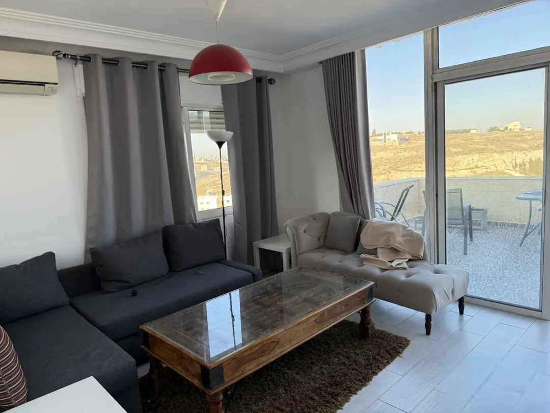 Furnished 2-bedroom rooftop for rent in the best location in Al Yasmeen (Rabwat Abdoun)